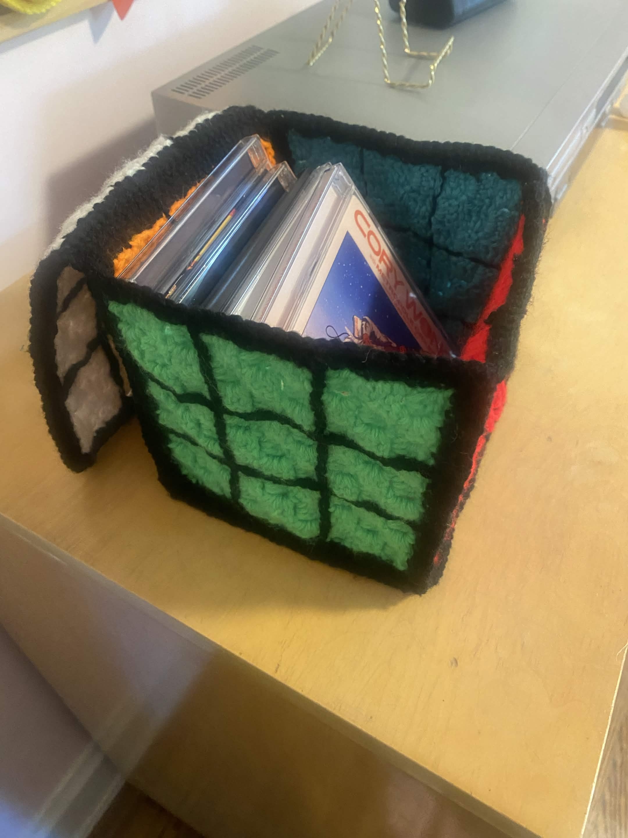 bag open, can see colors of each side and cds in the bag