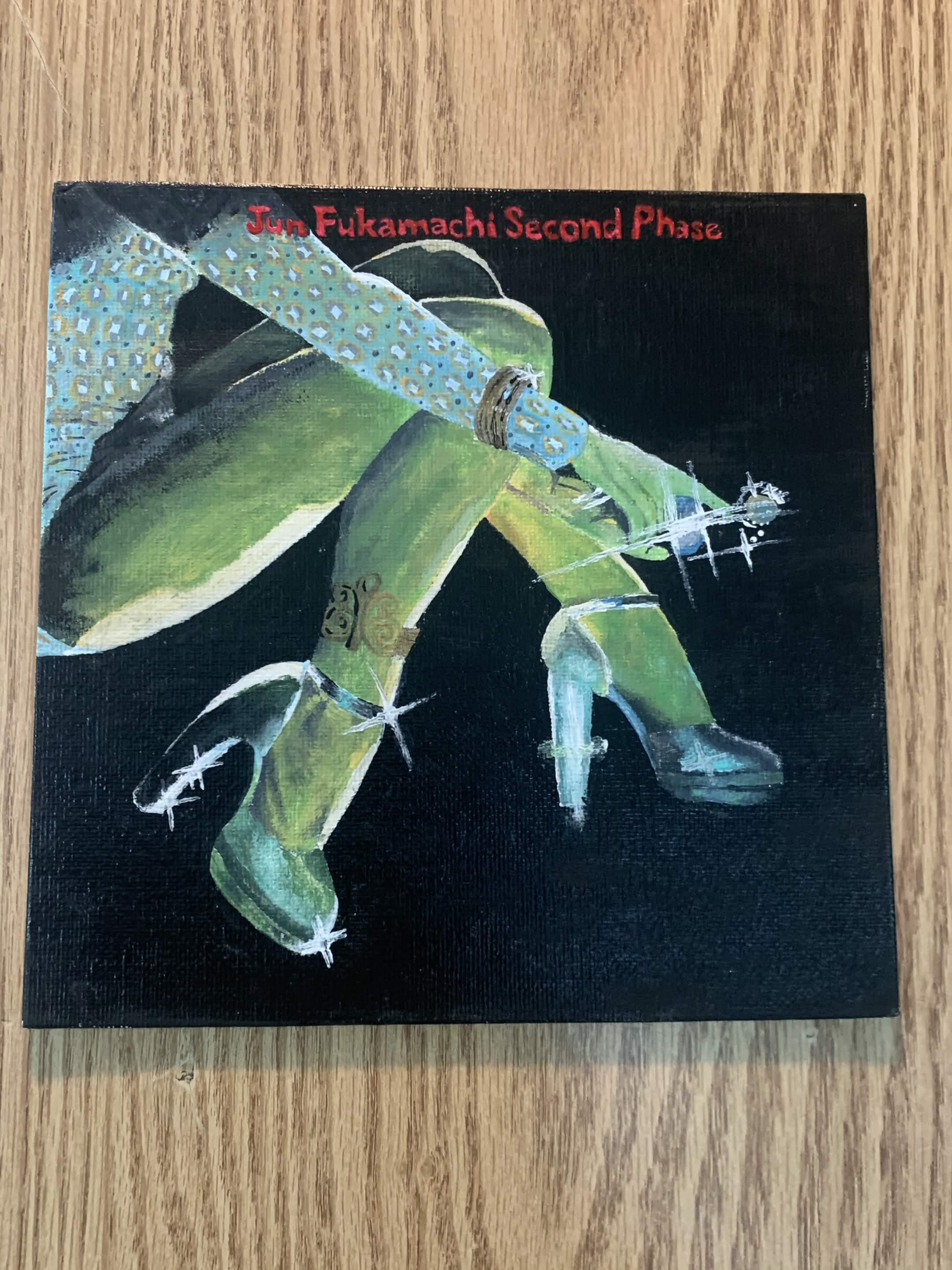 square canvas, womans lower body in jumpsuit with green tint